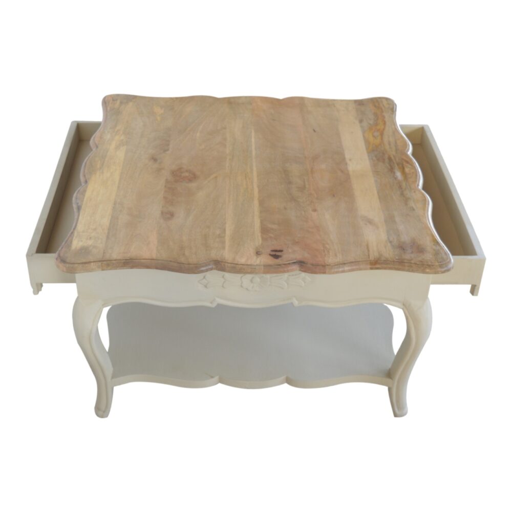 Amberly Carved Coffee Table for resell